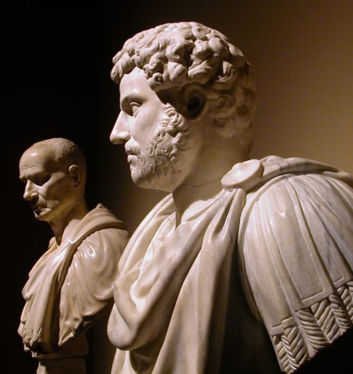 Picture of two ancient Roman men in marble sculpture